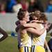 The Chelsea cross country team embraces each other after competing in the MHSAA Division Two race on Saturday. Chelsea finished 19th. Daniel Brenner I AnnArbor.com